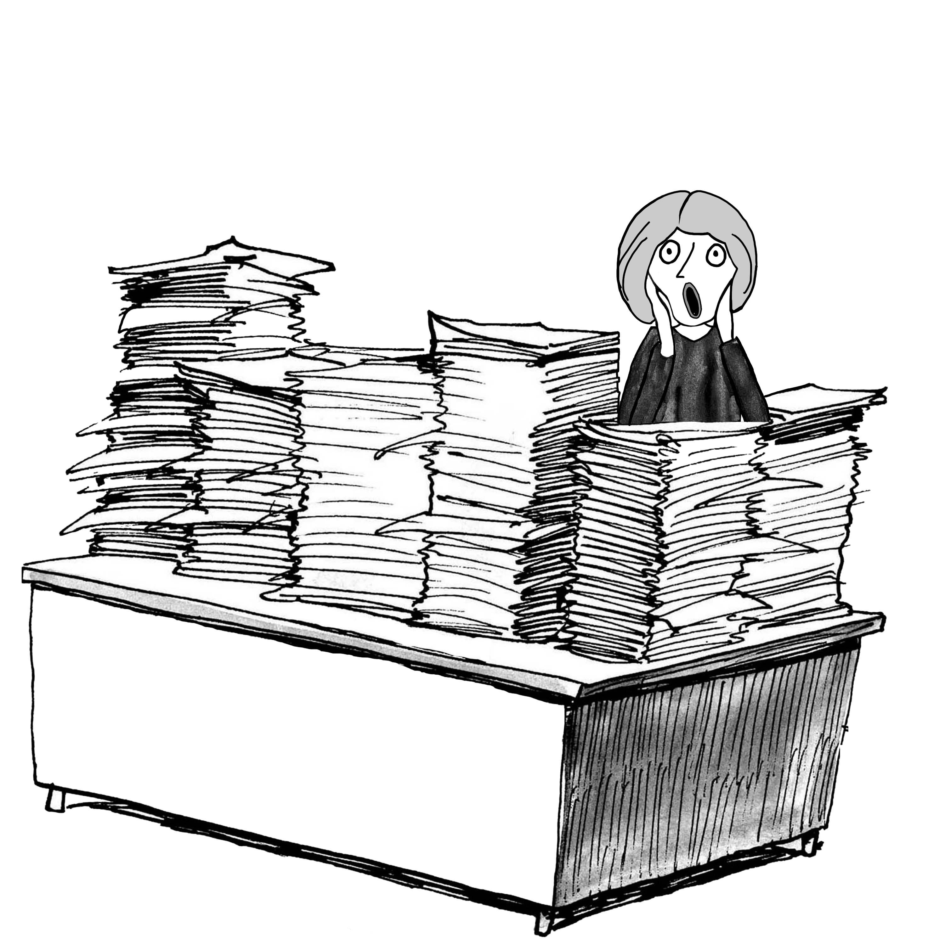 Desk filled with paper