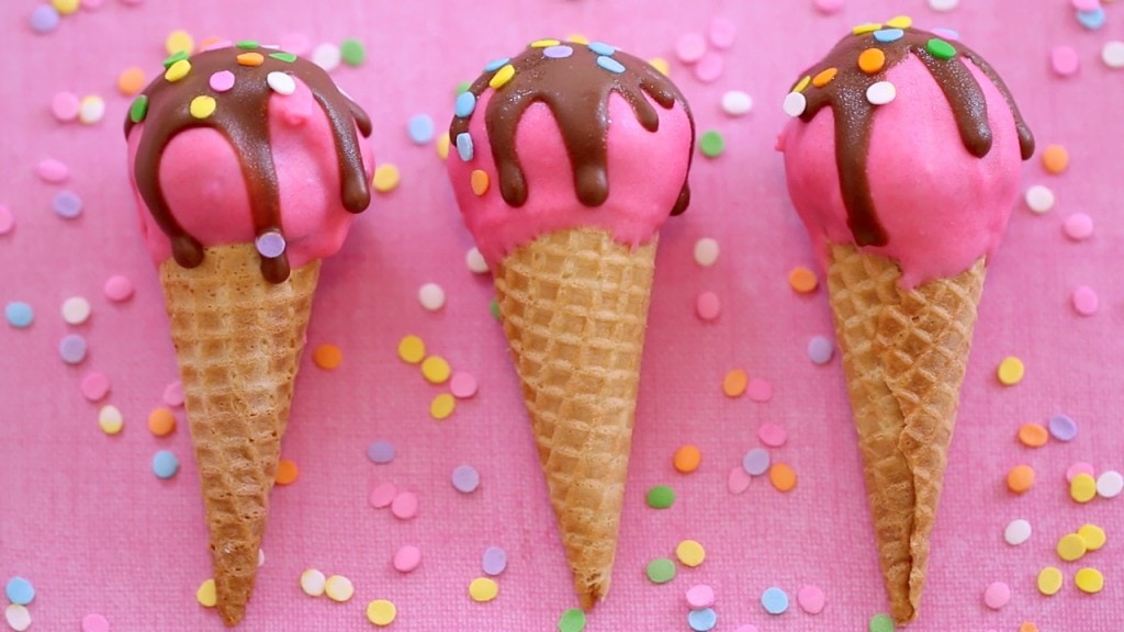 Little pink ice cream cones against a pink background