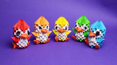 5 little penguins made out of 3D origami