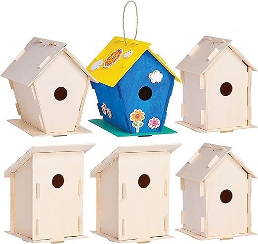 Six wooden birdhouses, one is painted blue with a yellow roof.